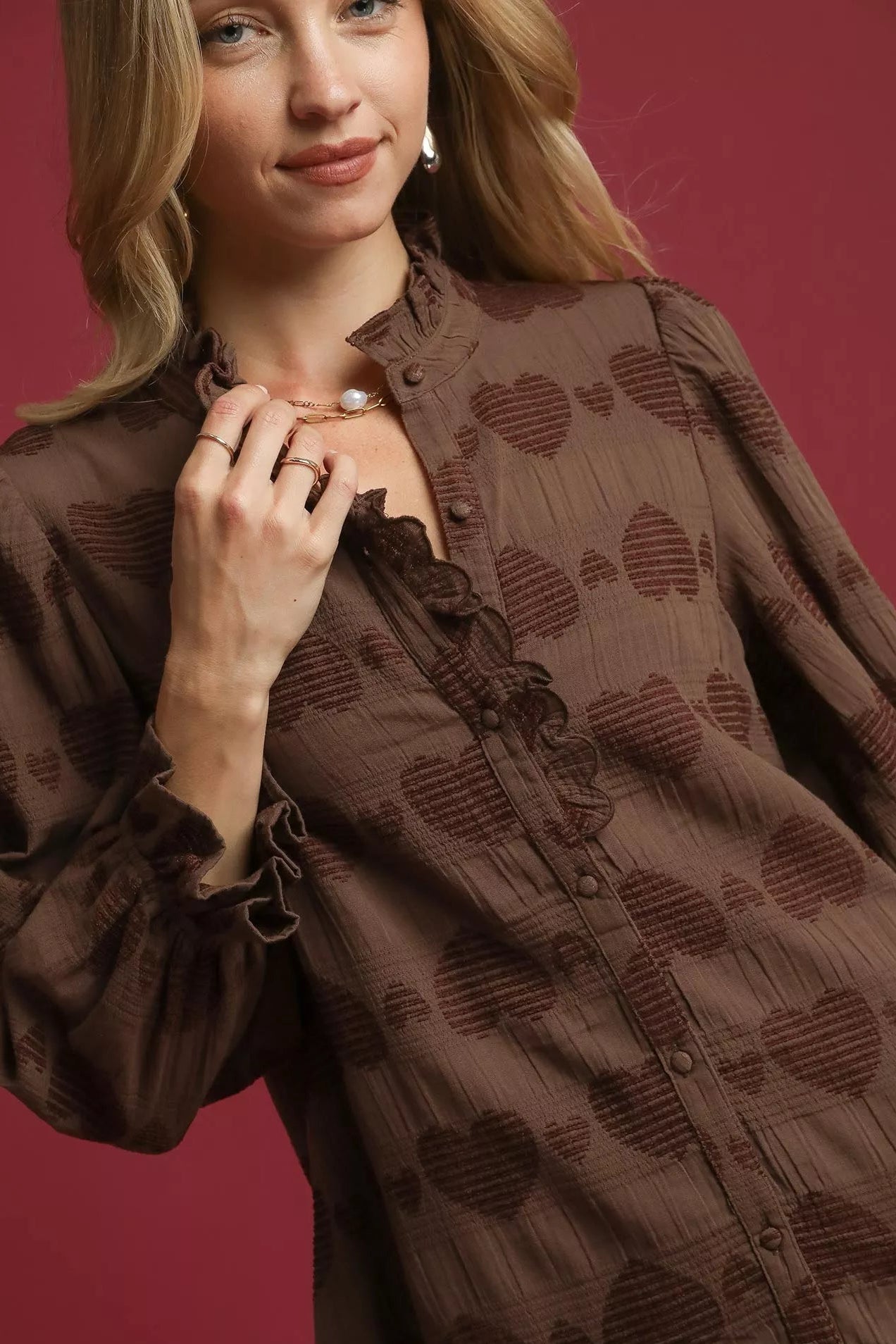 Sarah Express women’s heart jacquard shirt featuring delicate ruffle trim detailing.