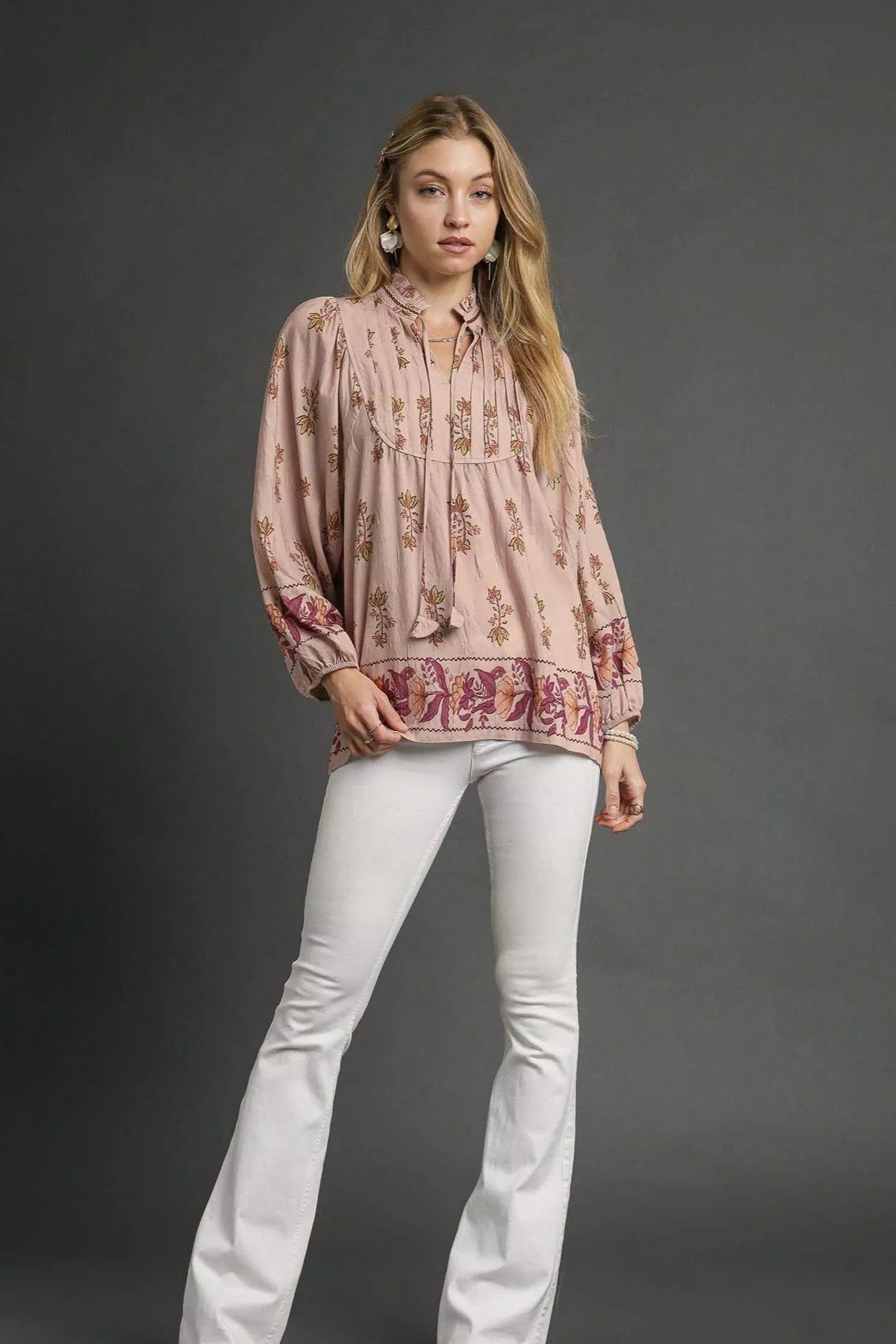 Sarah Express women’s floral boho peasant blouse with long balloon sleeves and a split tie neckline.