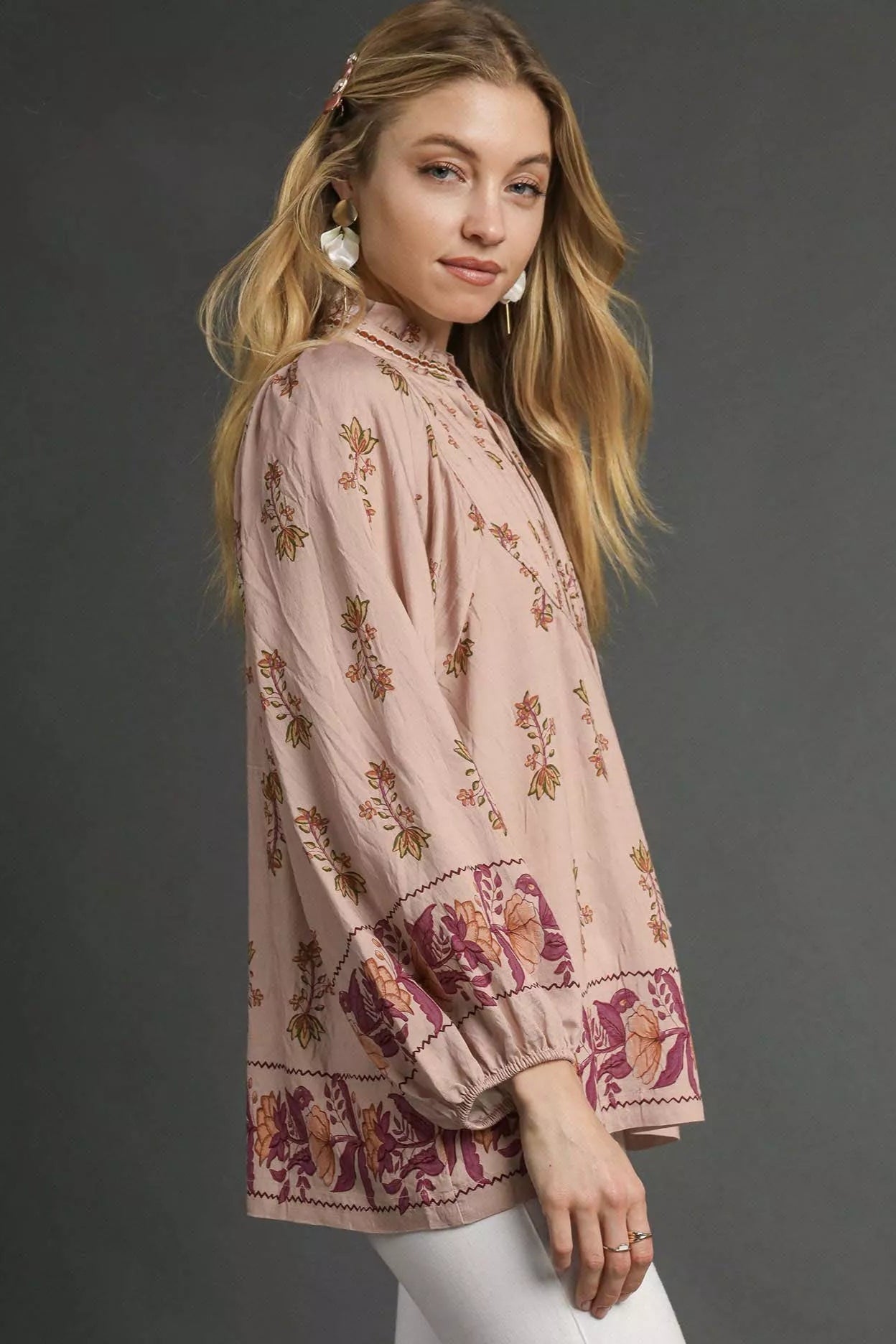 Sarah Express women’s floral boho peasant blouse with long balloon sleeves and a split tie neckline.