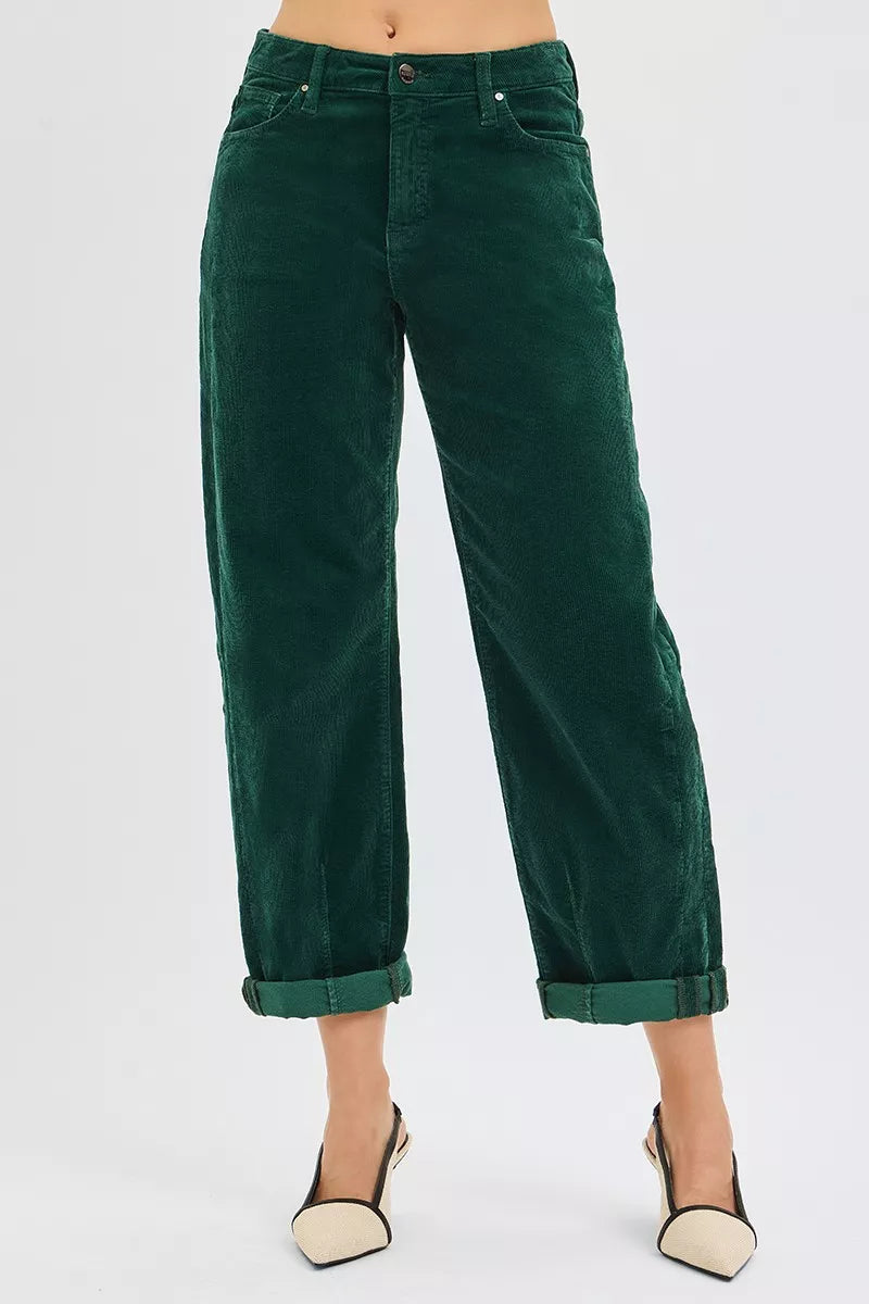 Women wearing high-rise crop barrel corduroy pants in hunter green - 2026 fashion trend