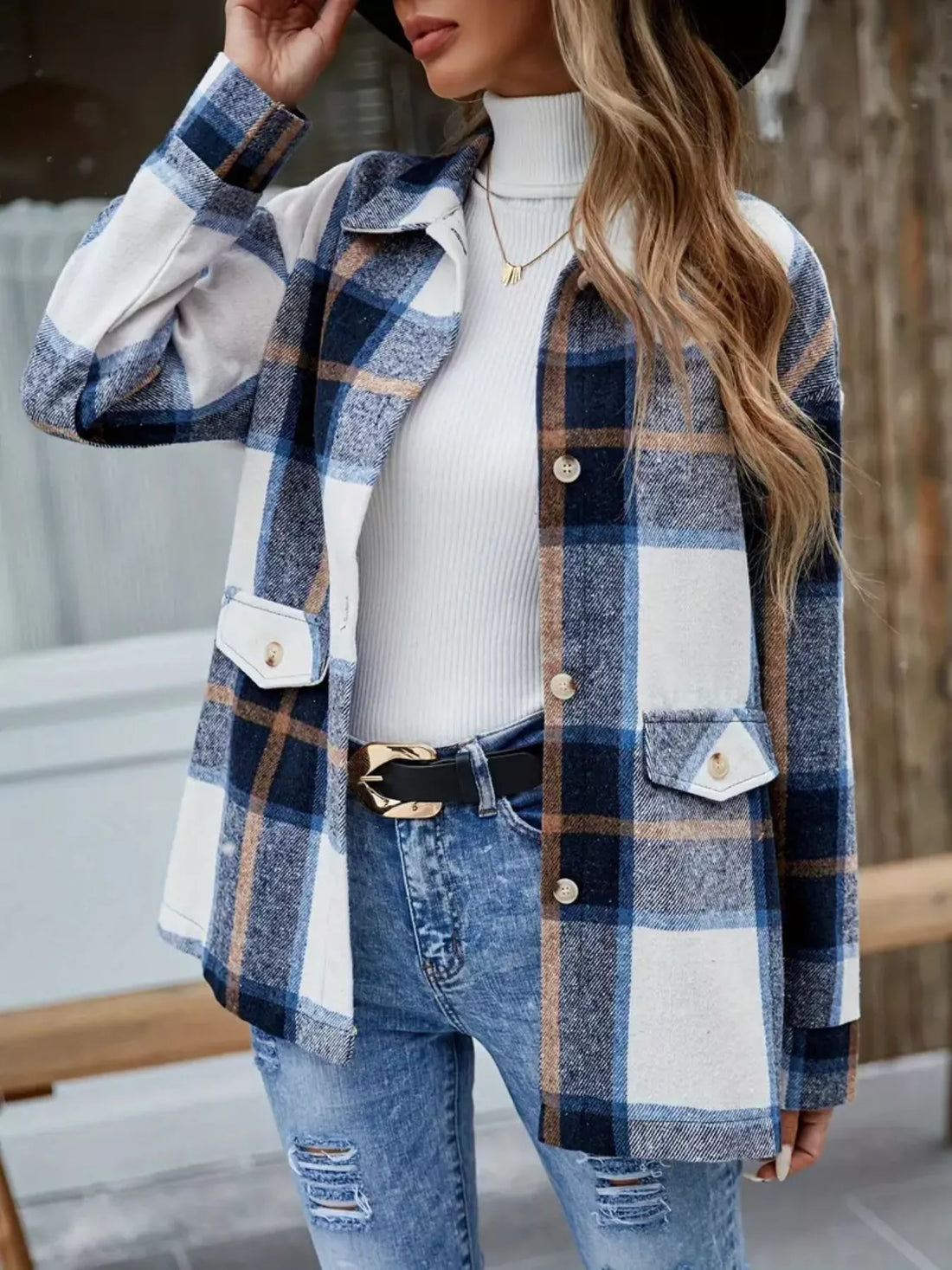 Woman wearing a stylish plaid button-up shacket - fall fashion essential