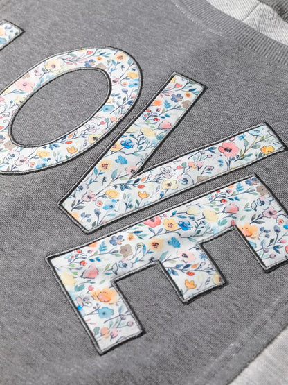 Sarah Express Women's LOVE Graphic Exposed Seam Patchwork Uneven Hem Chic Sweatshirt