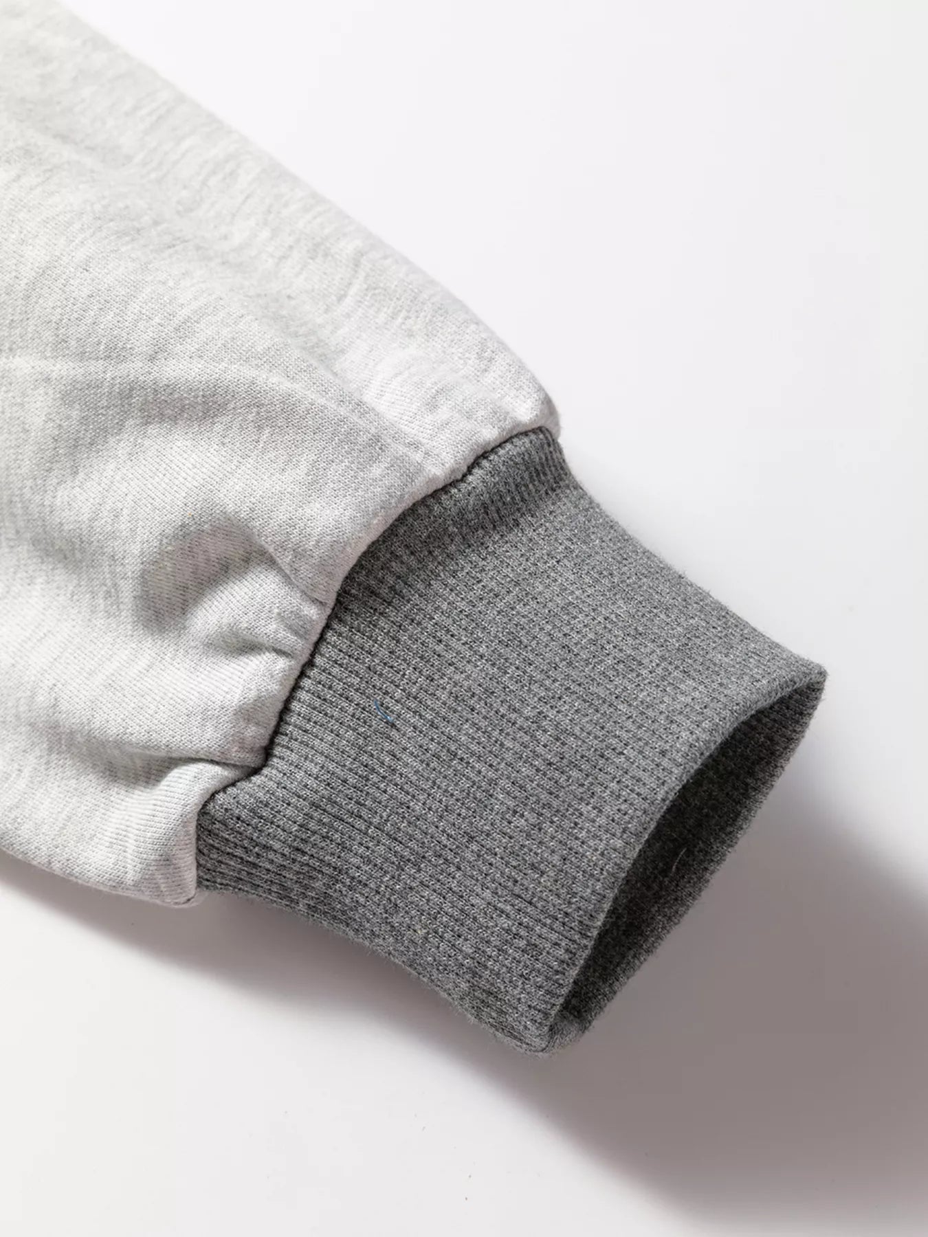 Sarah Express Women's LOVE Graphic Exposed Seam Patchwork Uneven Hem Chic Sweatshirt