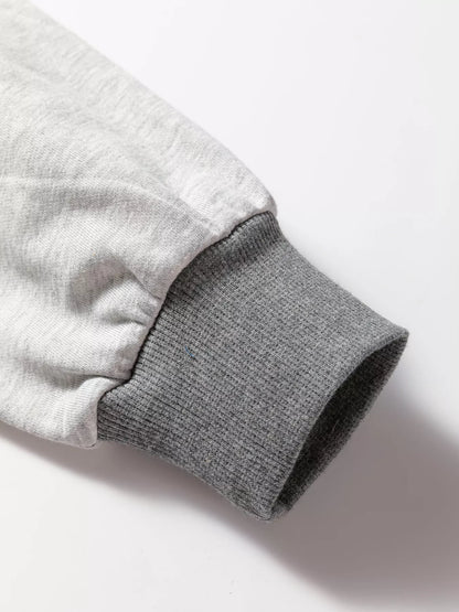 Sarah Express Women's LOVE Graphic Exposed Seam Patchwork Uneven Hem Chic Sweatshirt