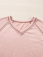 Sarah Express Women's Exposed Seam Ribbed Knit V Neck Top