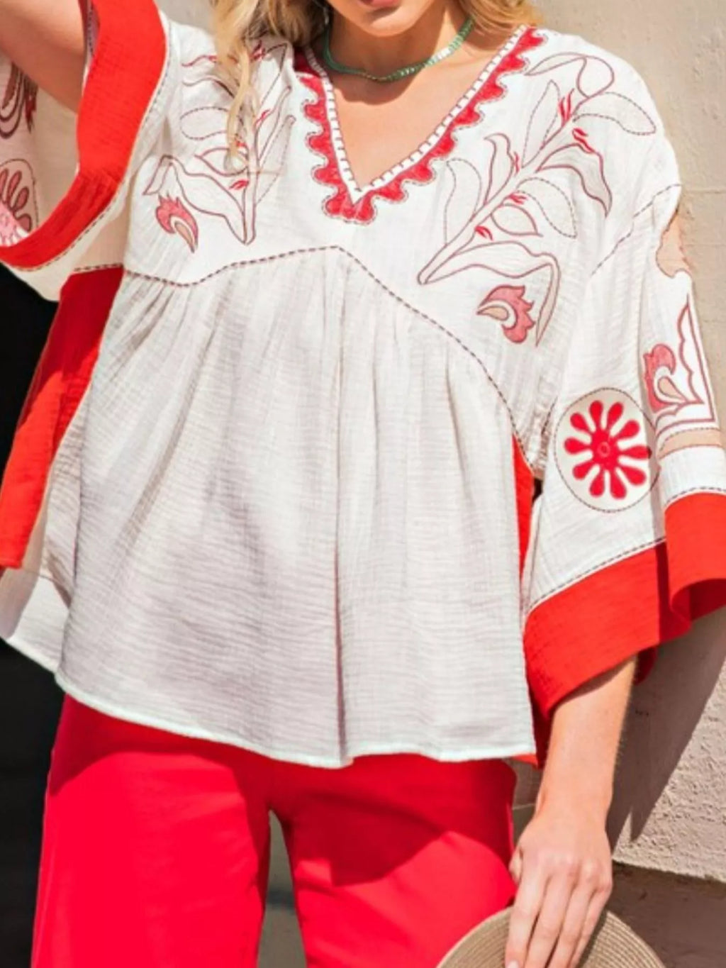 Sarah Express Women's Printed V-Neck Top with Contrast Trim Details