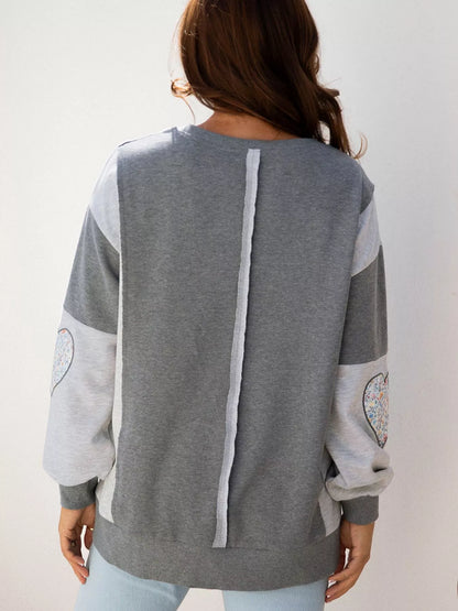 Sarah Express Women's LOVE Graphic Exposed Seam Patchwork Uneven Hem Chic Sweatshirt