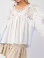 Sarah Express Women's Printed V-Neck Top with Contrast Trim Details