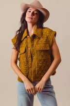 Sarah Express women’s quilted knit vest with a triangle stitch pattern, front pockets, and a button-up front.
