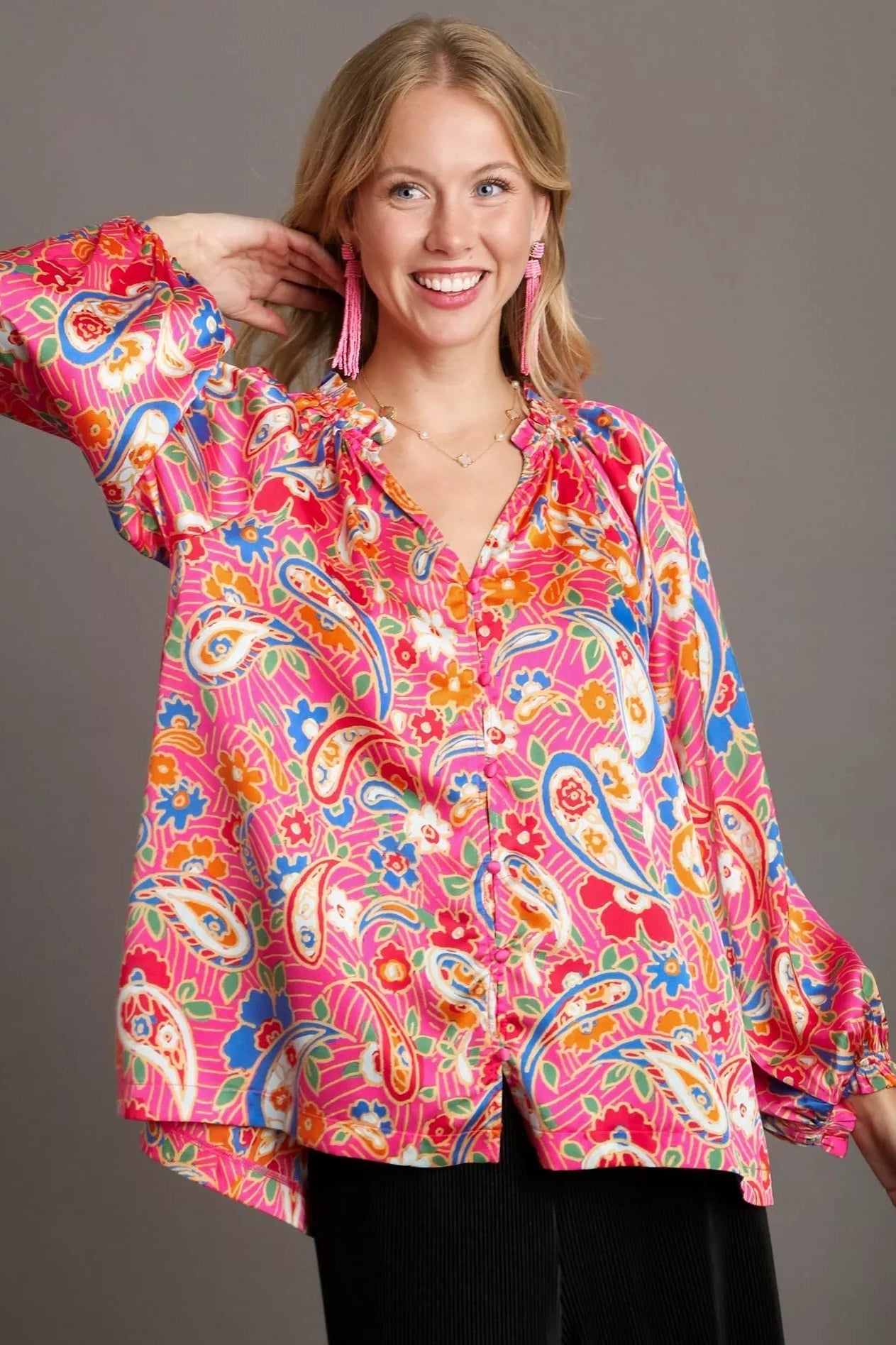 Sarah Express women’s plus size satin shirt in a vibrant paisley print with an elegant ruffle neck.
