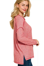 Sarah Express women’s plus size melange hacci tee with edgy exposed seams and a hi-low hem.