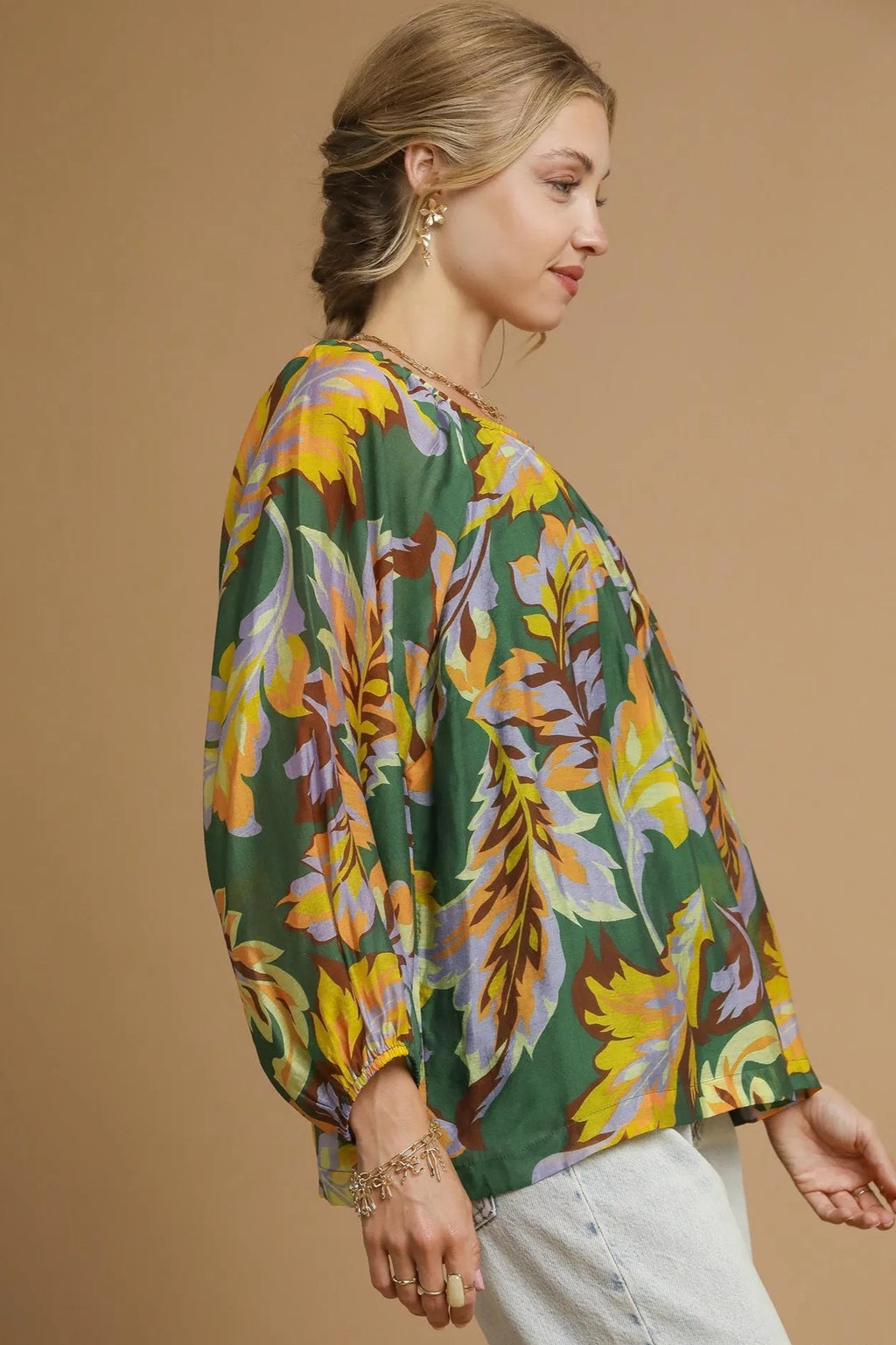 Sarah Express women’s abstract print blouse with dramatic balloon sleeves and ruched details.