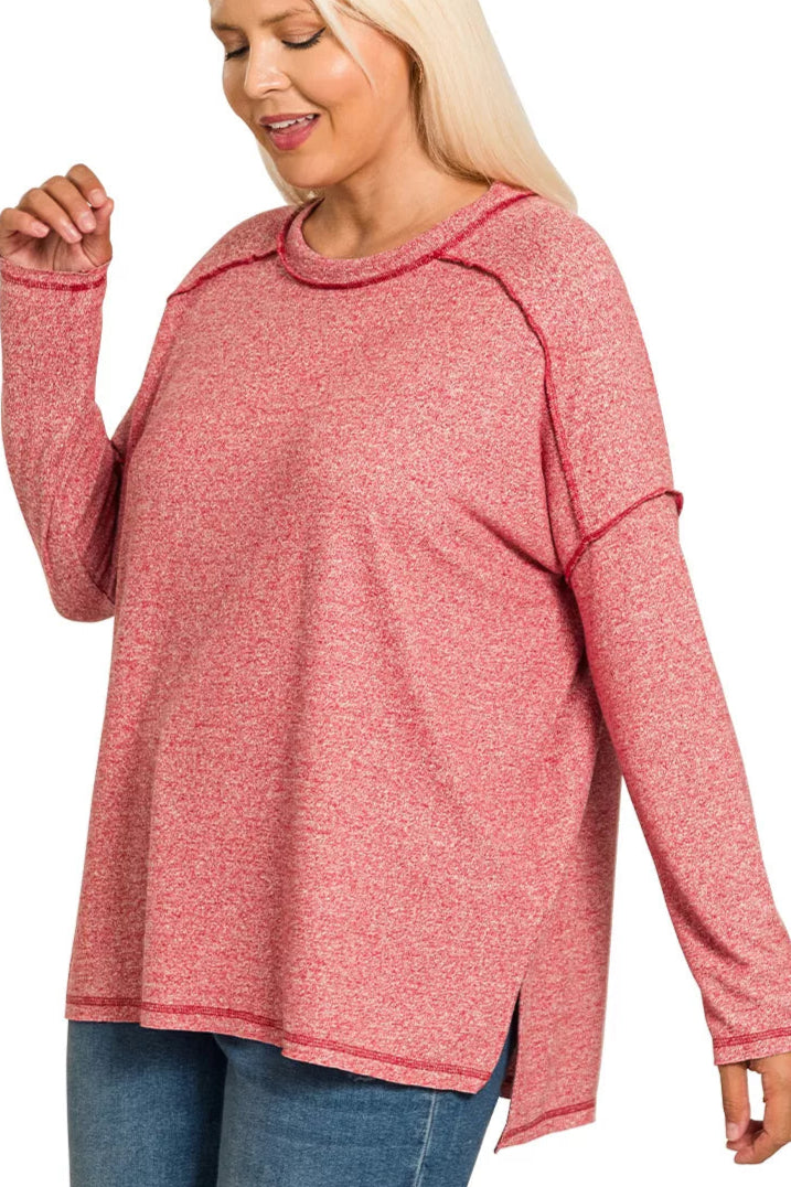 Sarah Express women’s plus size melange hacci tee with edgy exposed seams and a hi-low hem.