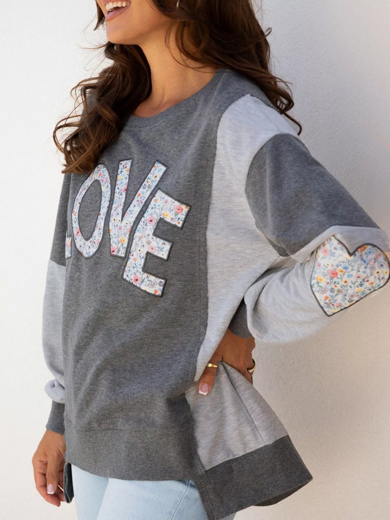 Sarah Express Women's LOVE Graphic Exposed Seam Patchwork Uneven Hem Chic Sweatshirt