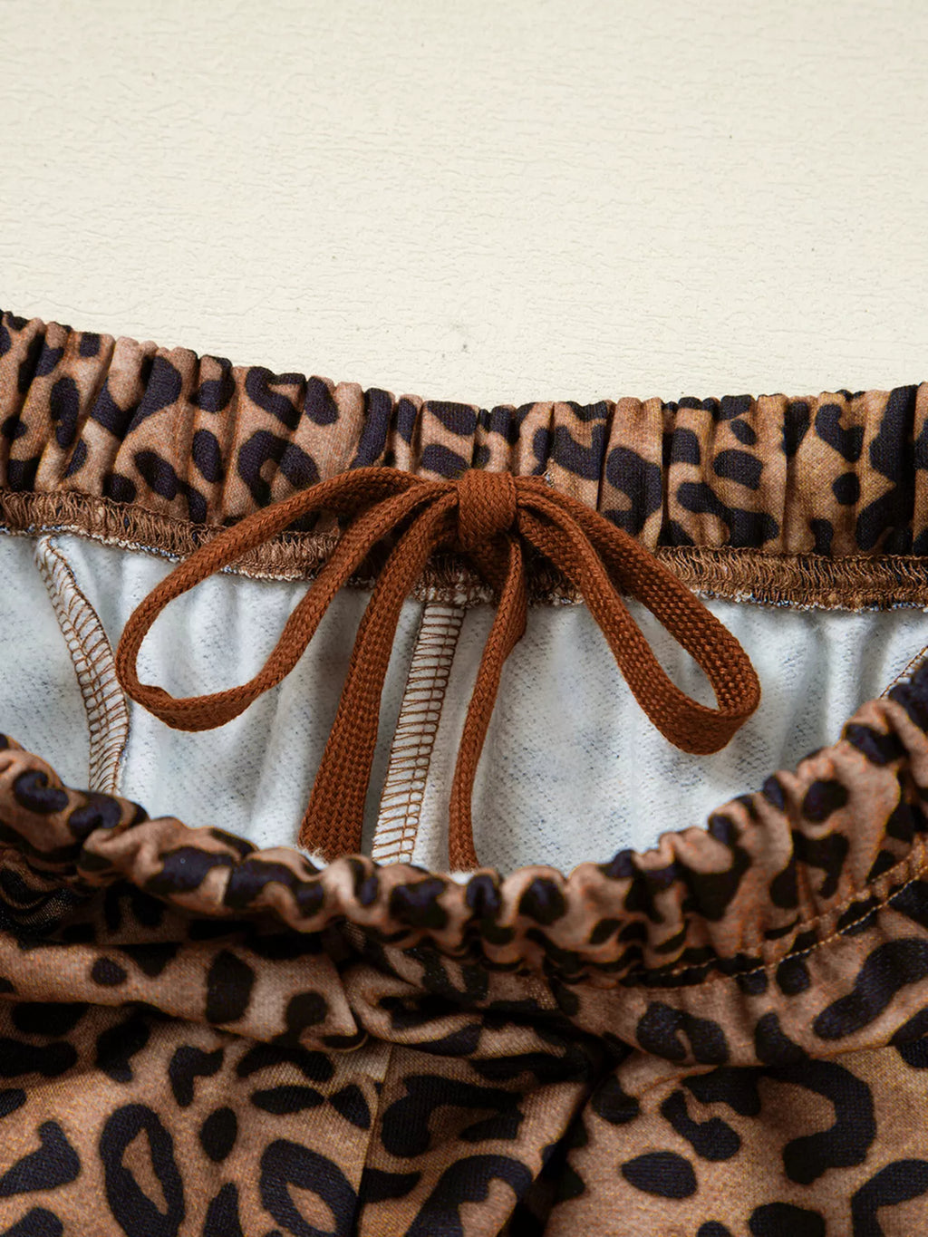 Sarah Express Women's Leopard Print Contrast Trim Long Sleeve Top and Pants Set