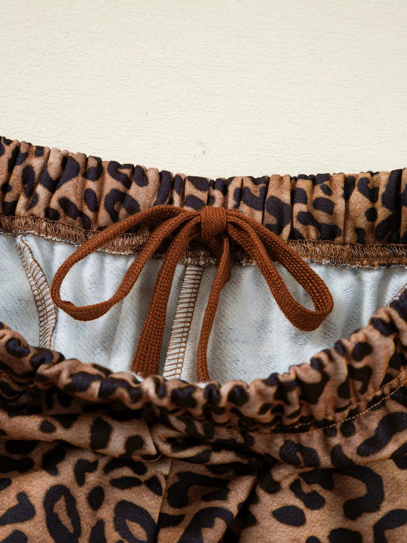 Sarah Express Women's Leopard Print Contrast Trim Long Sleeve Top and Pants Set