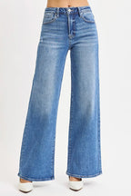 Sarah Express women’s plus size high rise wide leg jeans in a medium blue wash.
