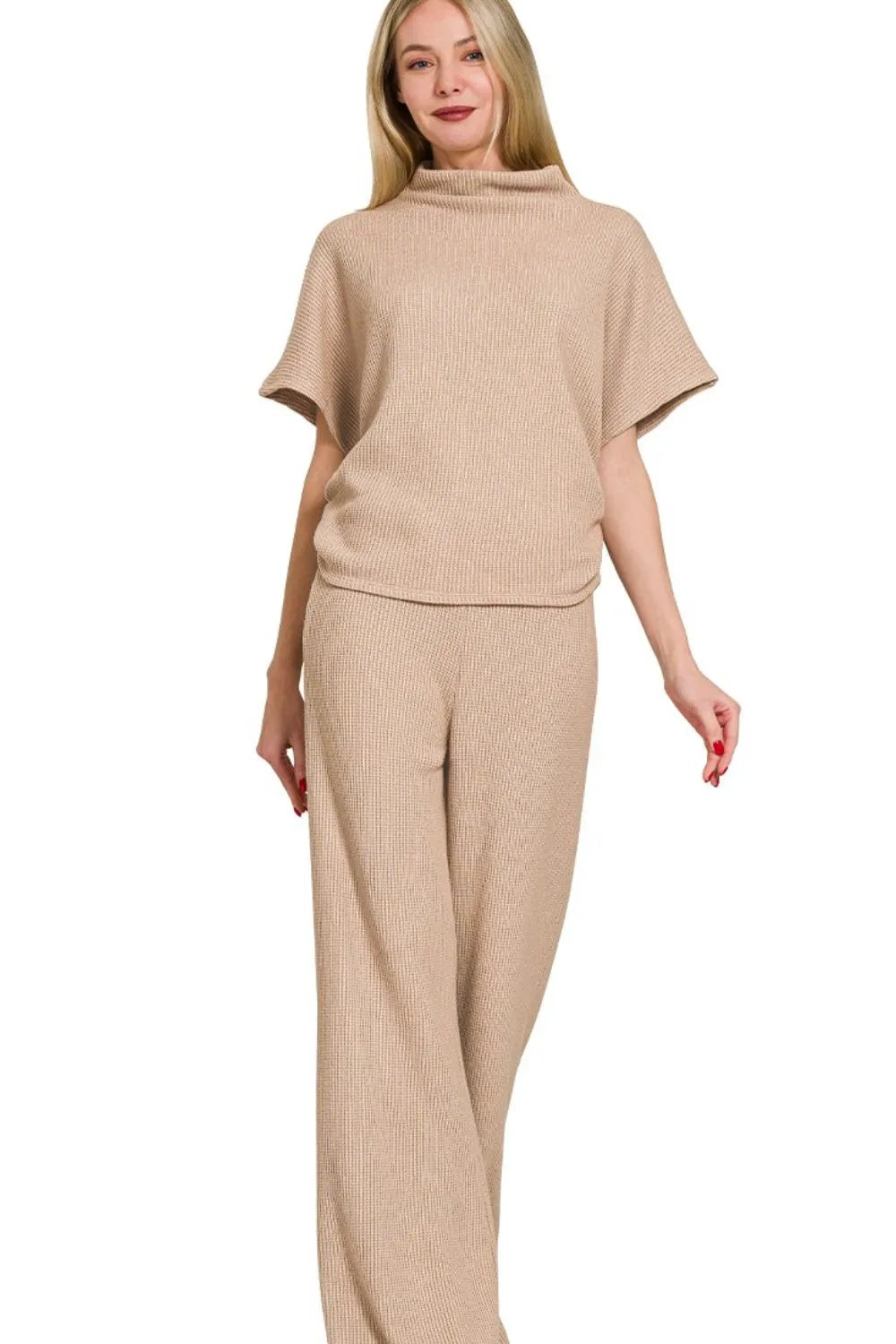 Sarah Express women’s beige ribbed sweater set featuring a turtleneck top and matching wide-leg pants.