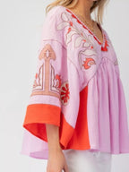 Sarah Express Women's Printed V-Neck Top with Contrast Trim Details