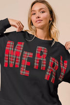Sarah Express women’s oversized Christmas fleece sweatshirt with plaid "Merry" lettering.
