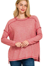 Sarah Express women’s plus size melange hacci tee with edgy exposed seams and a hi-low hem.