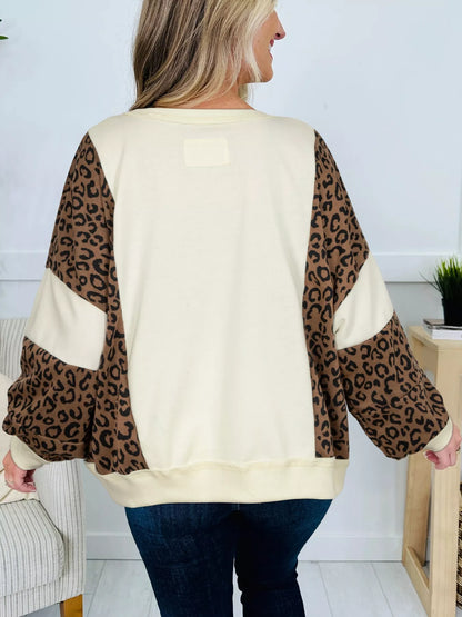 Sarah Express Women's Leopard Print Round Neck Sweatshirt with Pockets