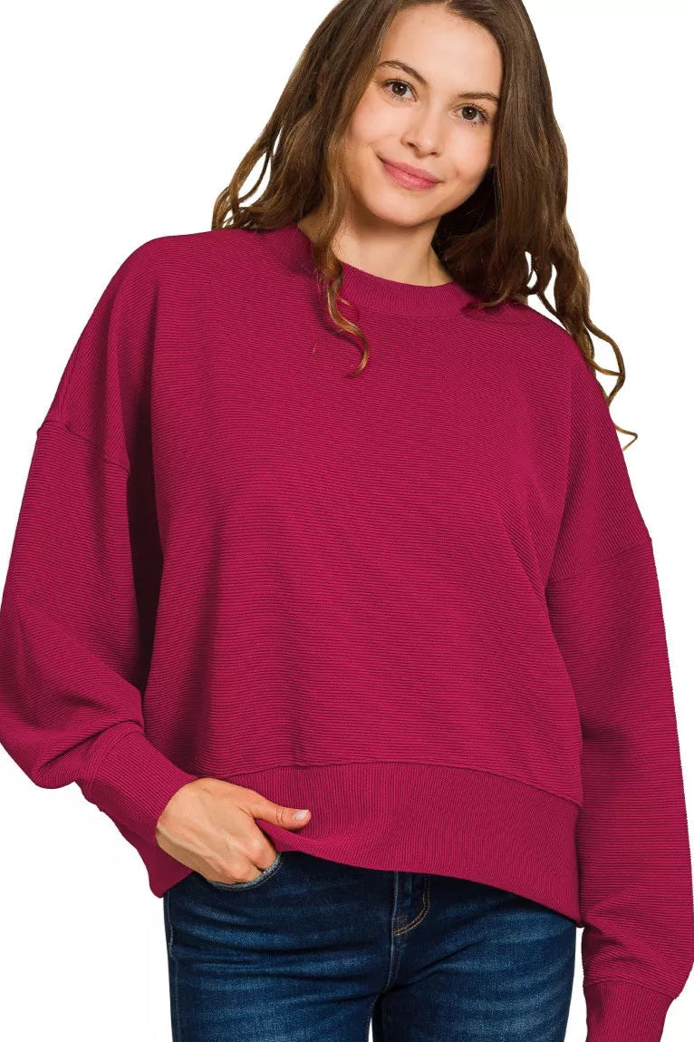 Sarah Express women’s ribbed two-piece lounge set with a round neck pullover top and matching drawstring pants.
