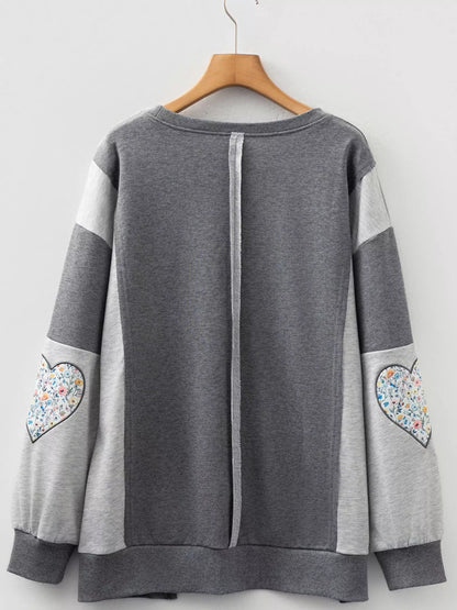 Sarah Express Women's LOVE Graphic Exposed Seam Patchwork Uneven Hem Chic Sweatshirt