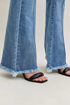 Sarah Express Women’s High Rise Flare Jeans with Fray Hem and Pintuck Detail