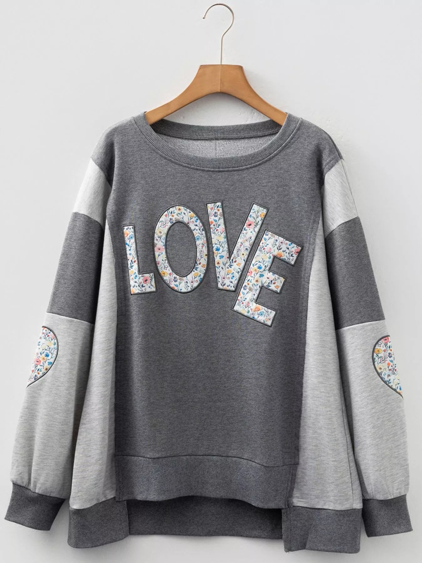 Sarah Express Women's LOVE Graphic Exposed Seam Patchwork Uneven Hem Chic Sweatshirt